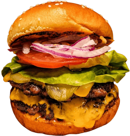 A loaded smash burger with melted cheese, lettuce, tomato and pickles